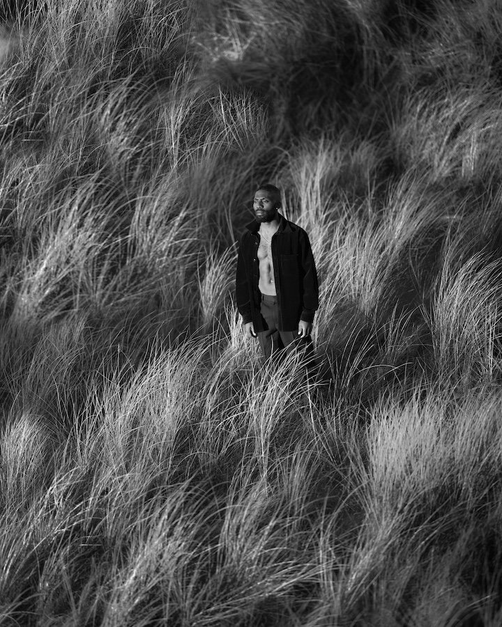 Black Paddy — portrait among the dunes