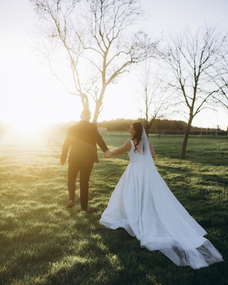 Dylan & Siobhan — stone wall wedding portrait, Ballymagarvey Village, Co. Meath