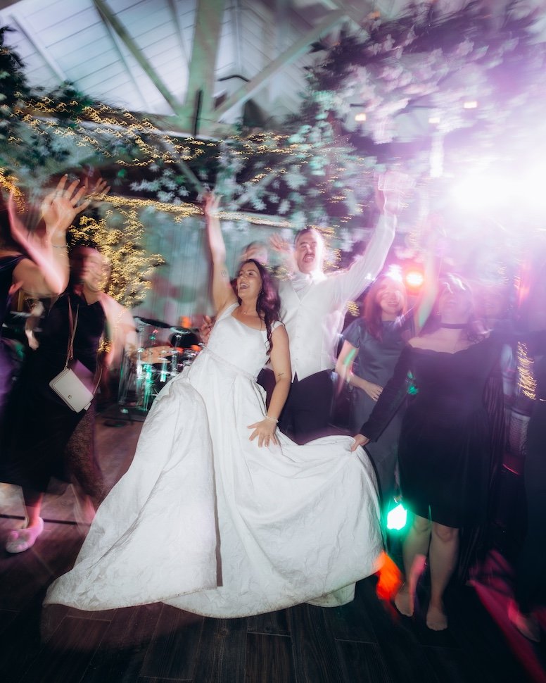Wedding reception at Ballymagarvey Village — guests celebrating, country house interior