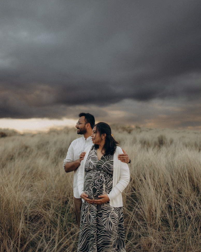 Priyanka at Bull Island — expecting, with Dublin Bay in the background