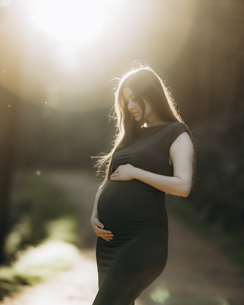 Tatiana — a quiet maternity portrait in the Glendalough pines, Co. Wicklow